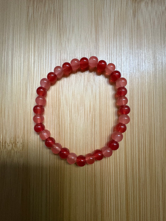 Reddish orange glass beaded bracelet