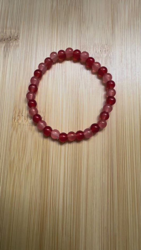 Reddish orange glass beaded bracelet